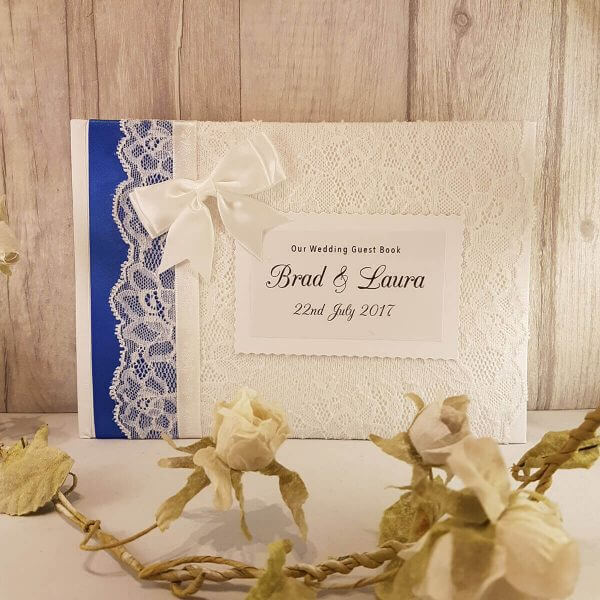 personalised wedding guest book with ribbon
