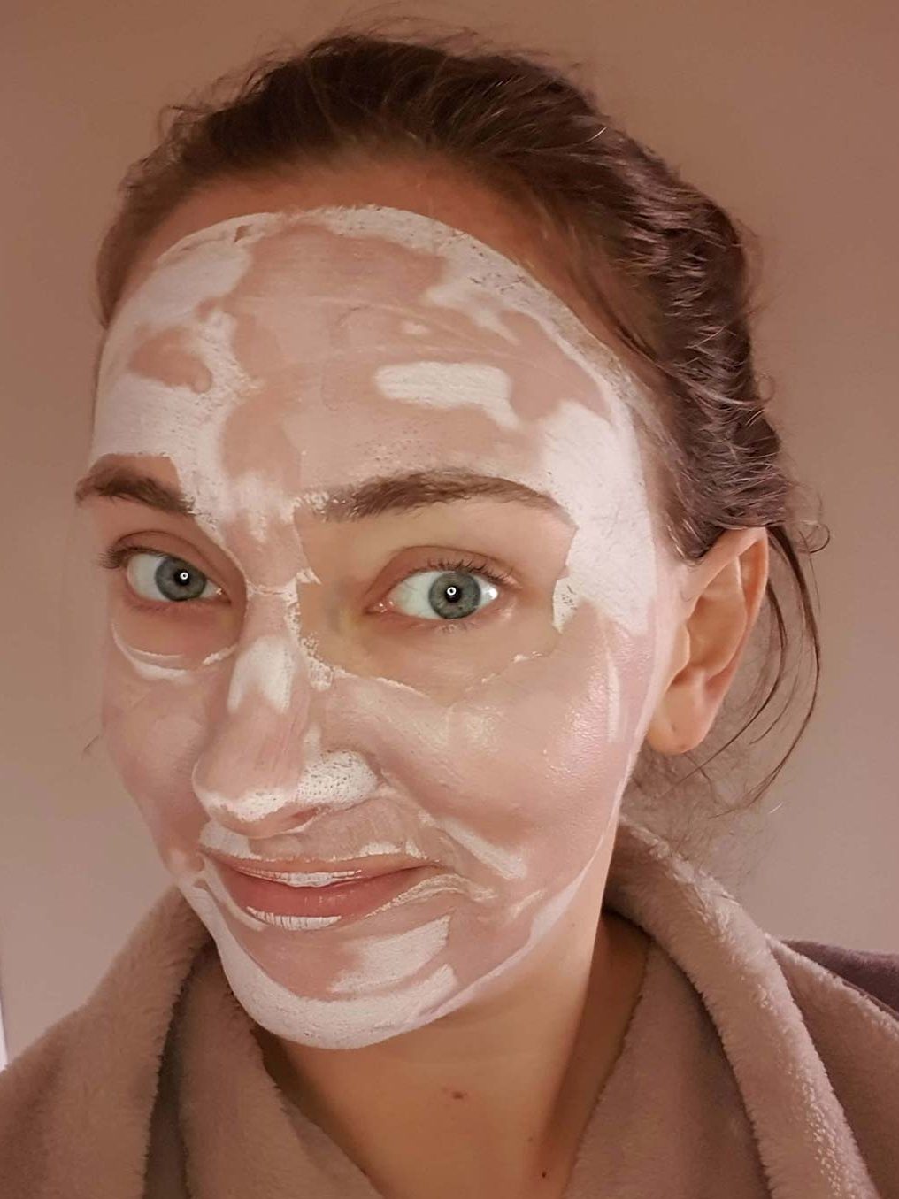 A photo of my face whilst using Sand and Sky Australian Pink Clay Mask 