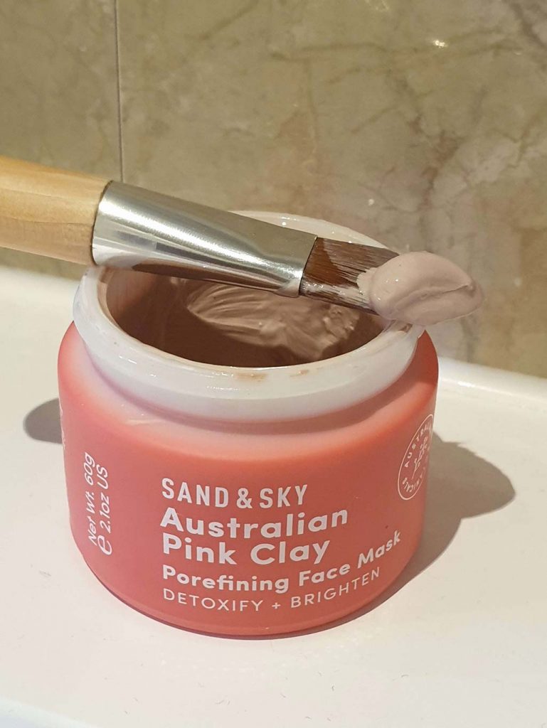 A photo Sand and Sky Australian Pink Clay Mask with brush