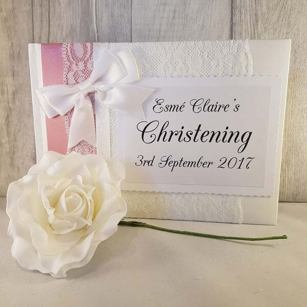 Personalised christening guestbook with dusky rose ribbon and shimmery lace