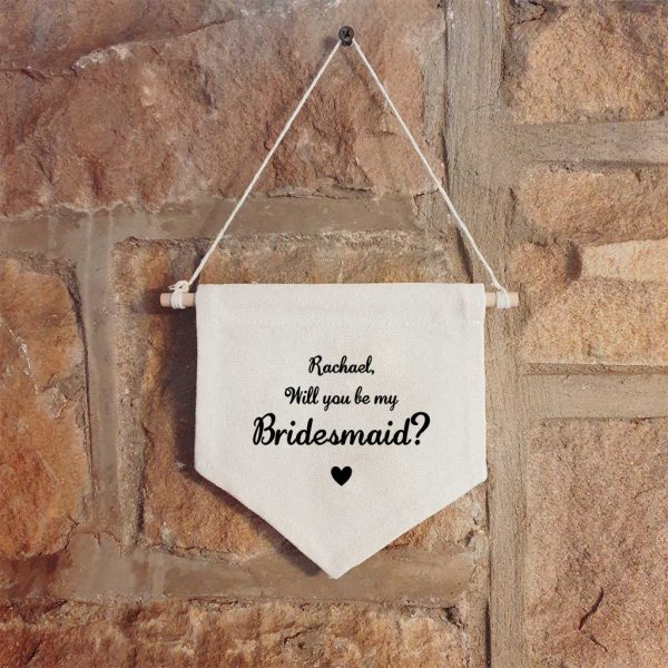 `Personalised hanging wall canvas banner with the text 'Will you be my Bridesmaid' with a space for a name