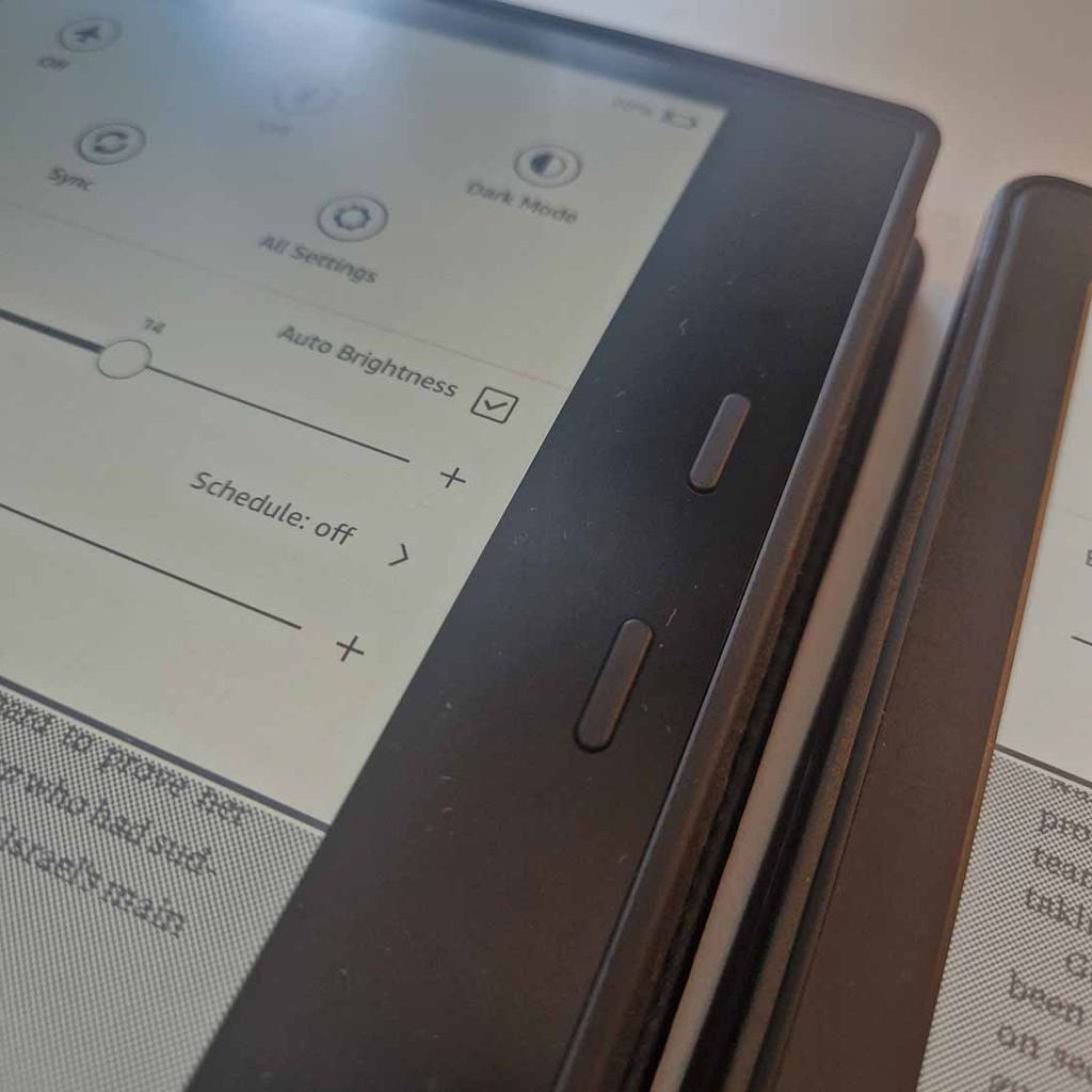 Amazon Kindle Oasis has buttons you use to turn the pages (as well as the usual page flick)